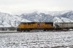 UP SD70M #4367 leads the northbound Cache Valley Local (LCG-41C) approaching the Airport Rd. Xing in Logan, Utah. April 13, 2022